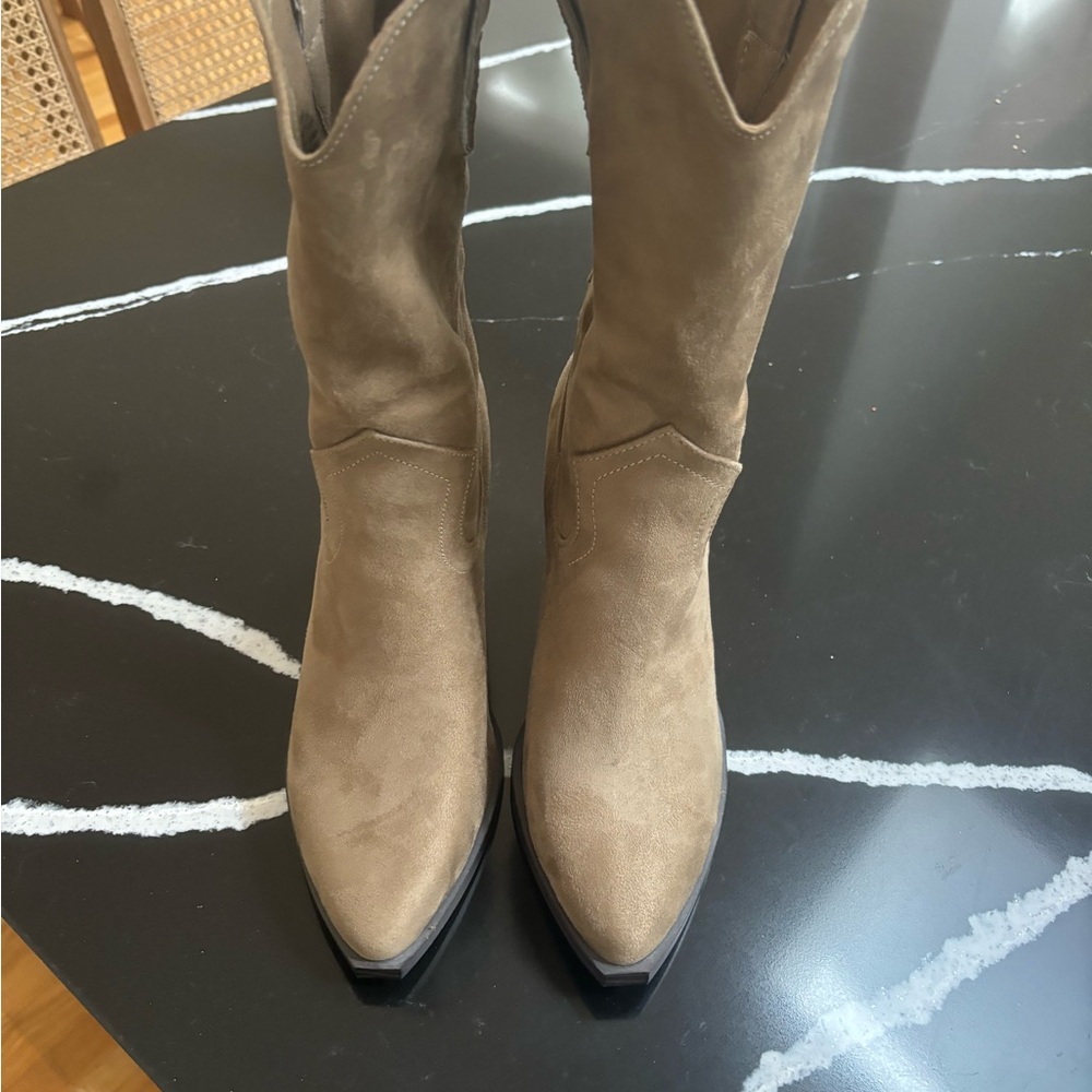 Indigo brand boot. Never worn.